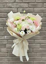 Букет цветов из:  Гвоздики, Розы, Лизиантусы и Хризантемы в Хурбе